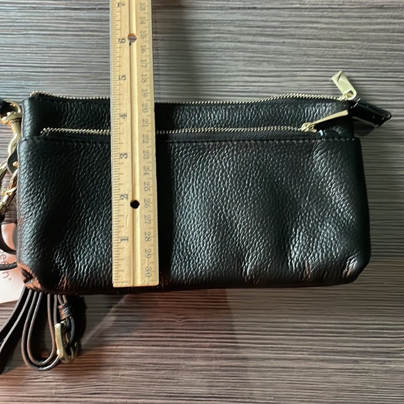 Small black leather crossbody with optional wristlet strap. - Picture 9 of 10
